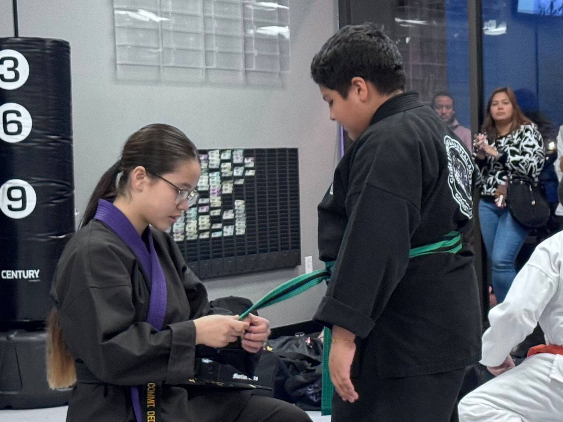 Two Family Program students working a partner drill at CORE Fitness & Martial Arts in Henderson