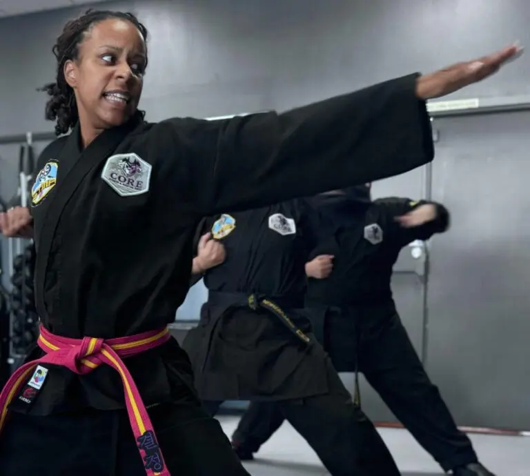 martial arts students performing techniques in a class