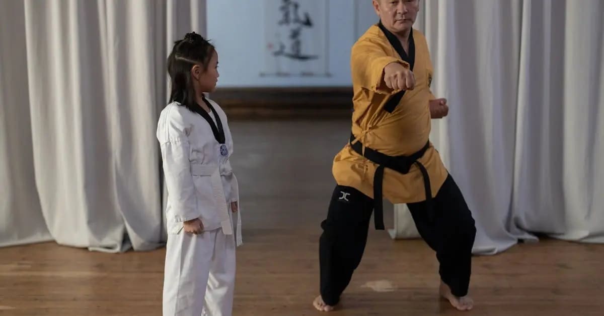 A certified instructor providing hands-on guidance to a new student on essential Taekwondo basics for beginners and hand techniques.