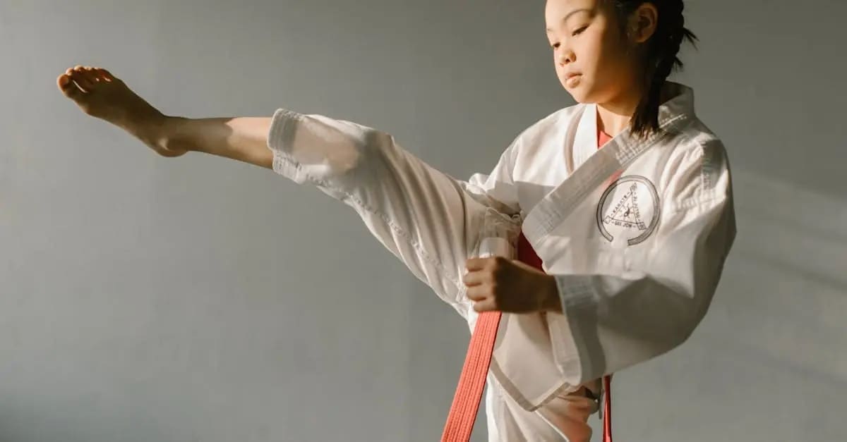 Close-up of a novice martial artist executing a front snap kick, a core component of Taekwondo basics for beginners.